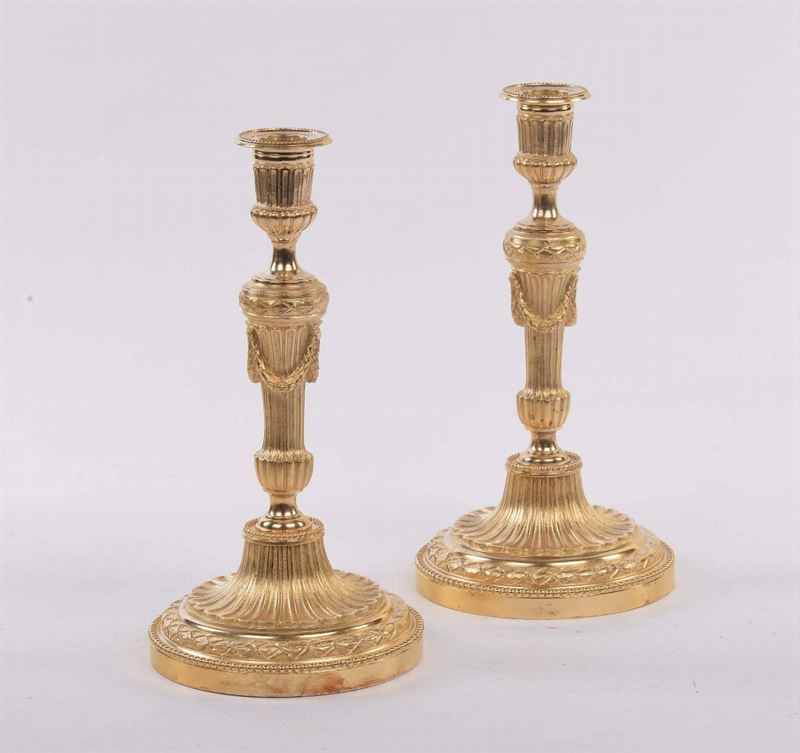 Coppia di candelieri in bronzo dorato  - Auction Antiques and Old Masters - Cambi Casa d'Aste