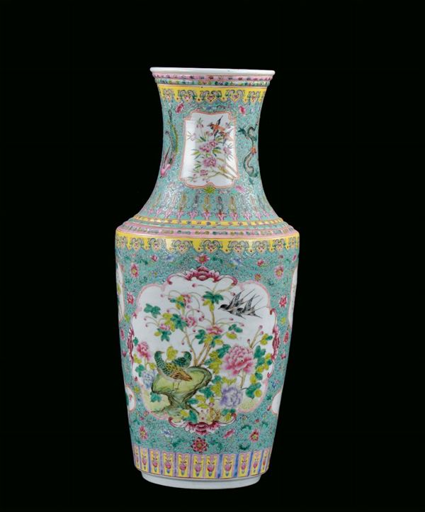 Famille Rose porcelain vase with polychrome decoration within reserves on light blue background, China, Qing Dynasty, end 19th century h cm