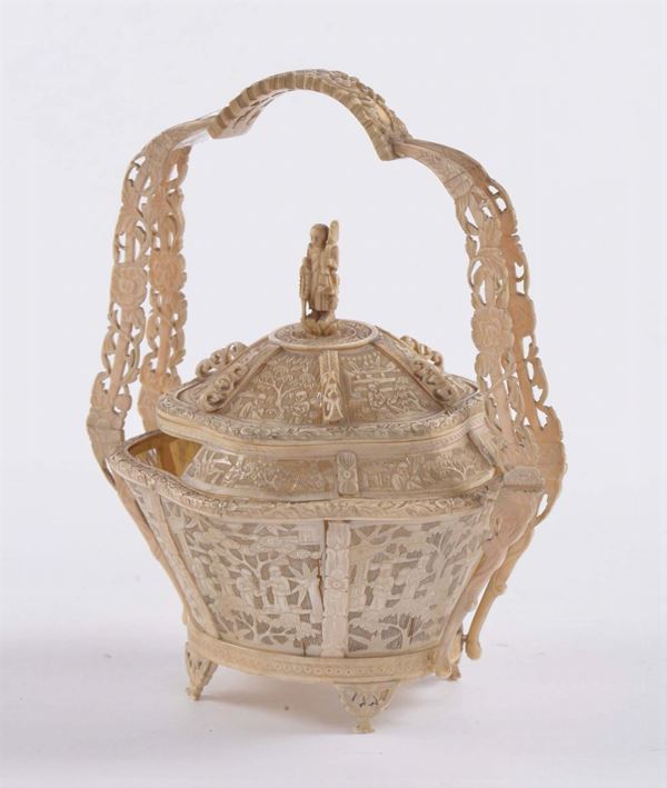 A small fretworked ivory basket, China, 19th century