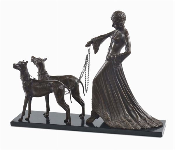 Gruppo in bronzo composto da donna con due levrieri su base in marmo firmata Ginori