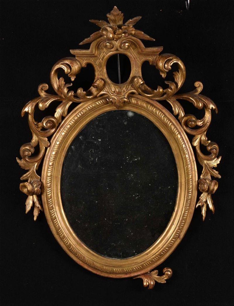 Specchiera in legno intagliato e dorato, XIX secolo  - Asta Arredi e Oggetti d'Arte da Importanti Collezioni Private - Cambi Casa d'Aste