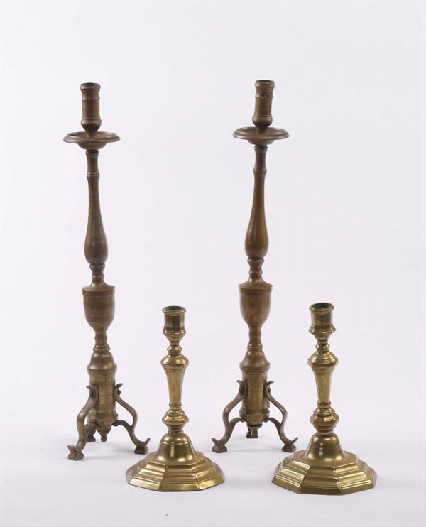 Due coppie di candelieri in bronzo