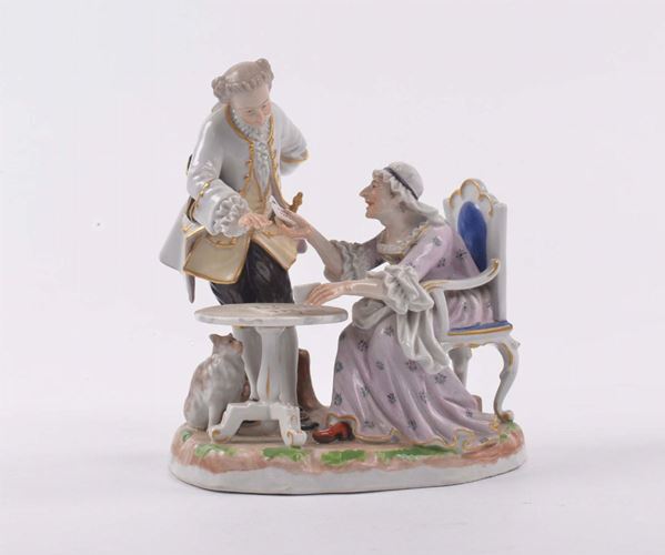 Gruppo in ceramica policroma raffigurante dama con giovane