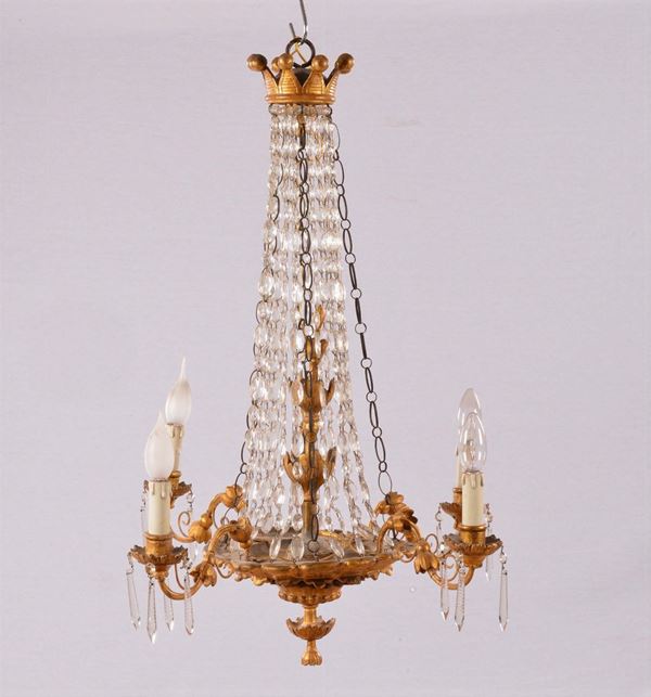 Lampadarietto in stile Luigi XVI in metallo e cristalli a quattro luci, XIX secolo