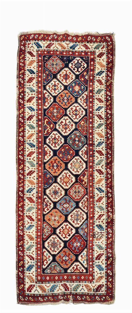 A Caucaso runner end 19th early 20th century.One hole in one edge.  - Auction Ancient Carpets - Cambi Casa d'Aste