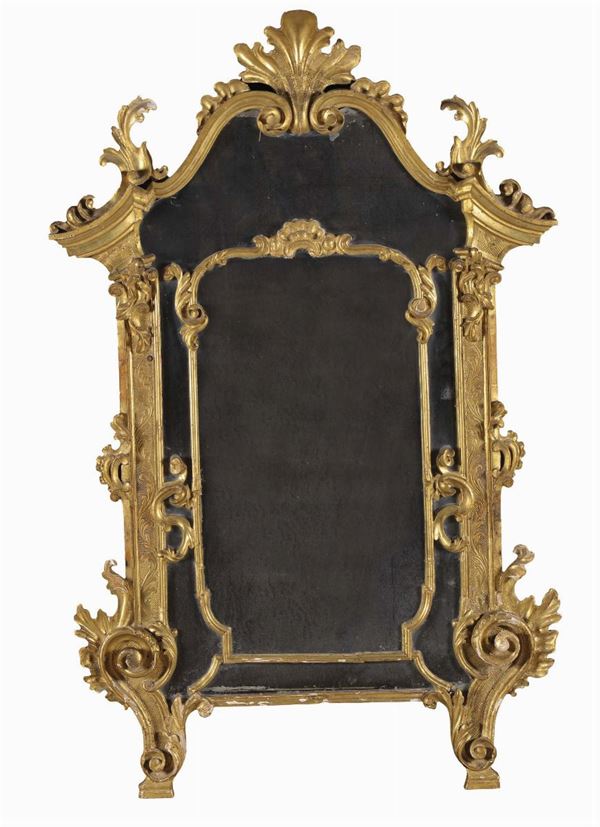Specchiera in stile Luigi XV in legno intagliato e dorato a mecca, XIX secolo