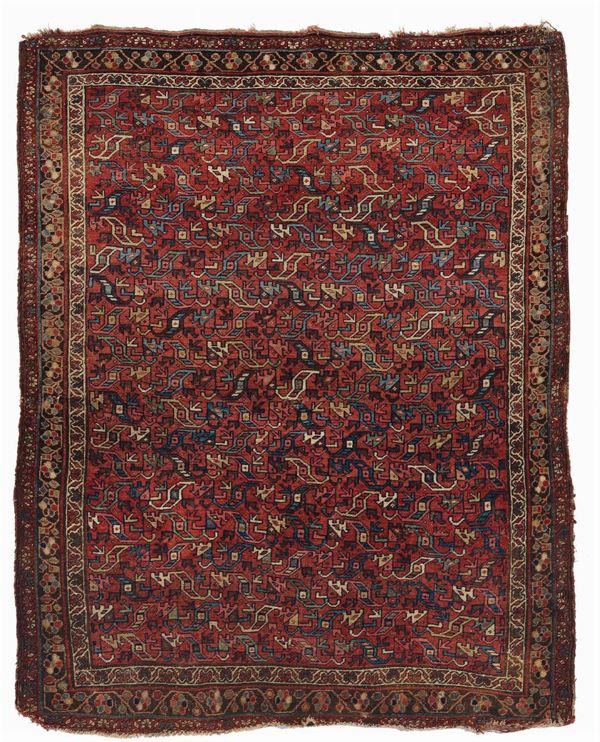 A northwest persian rug late 19th century.Damages.