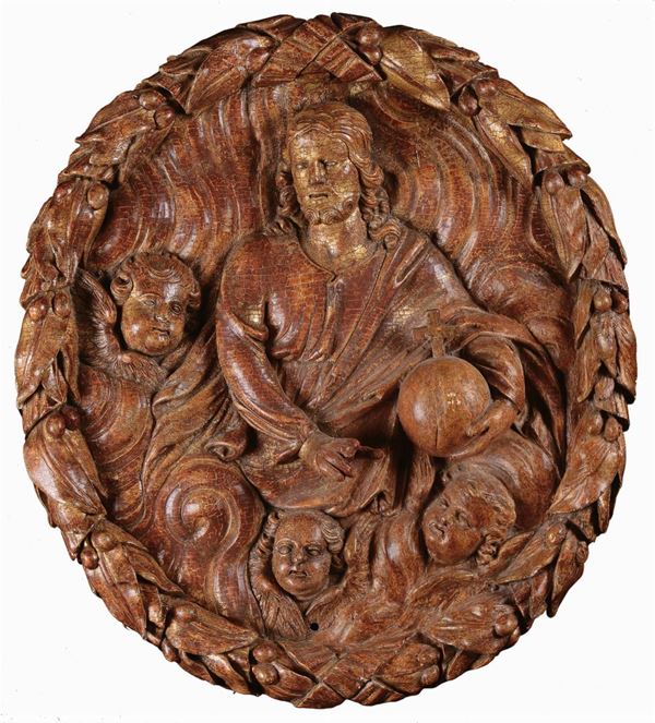 Tondo in legno scolpito raffigurante Cristo e Angeli, Toscana XVI secolo