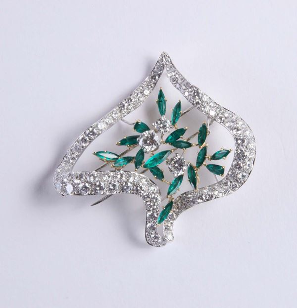 A 20th century impressive emerald and diamond brooch