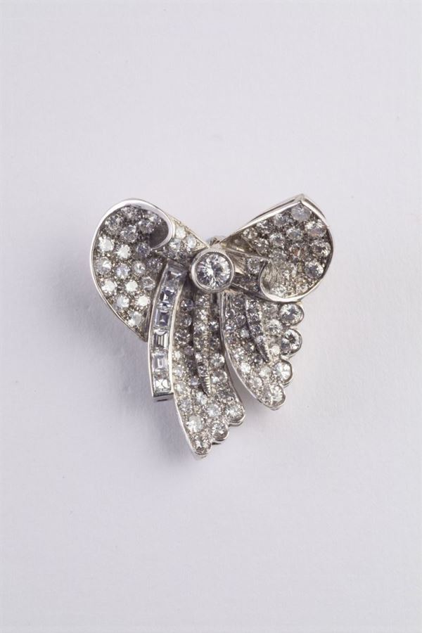A 20th century diamond bow clip brooch