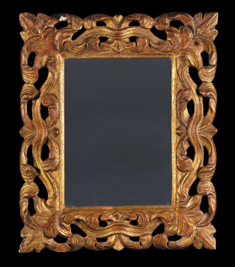 Specchiera in legno intagliato e dorato, XVIII secolo  - Asta La Dimora di un Conoscitore Bolognese - Cambi Casa d'Aste