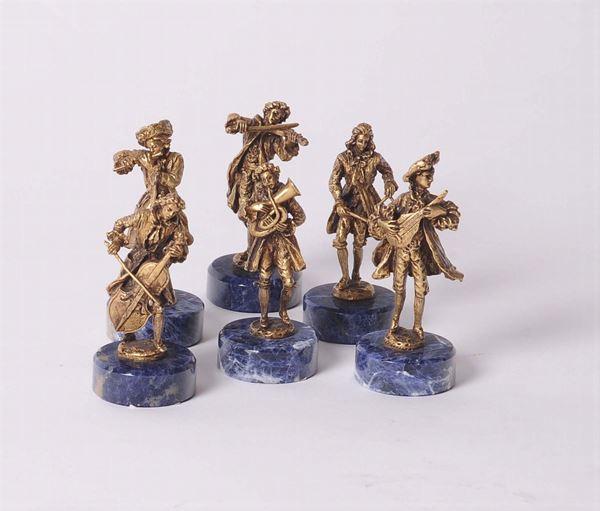 Lotto di sei statuine in bronzo raffiguranti suonatori