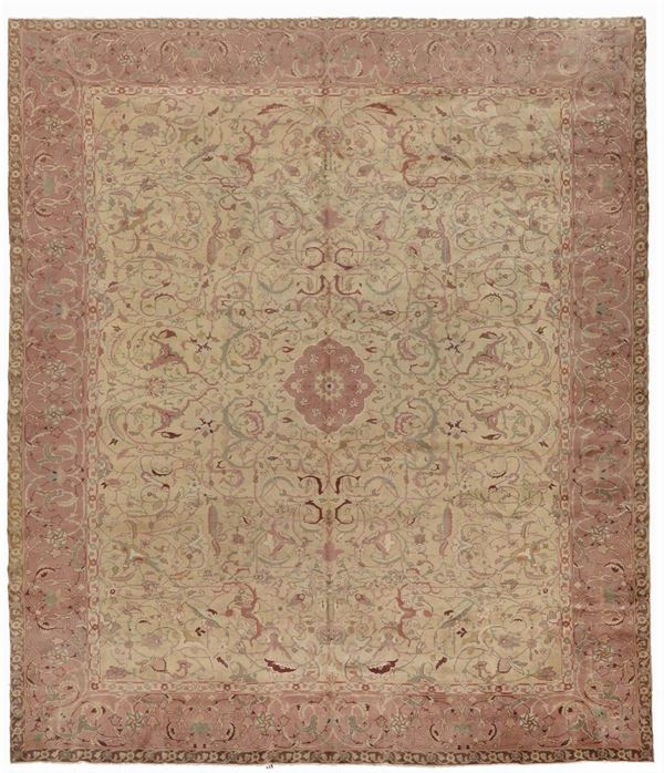 A Persia Tabriz carpet early 20thcentury signed.The decoration of this carpet is similar to the Isfhan silk carpet from the collection Doris Duck sold in Christie's in 2008.Overall very good condition.