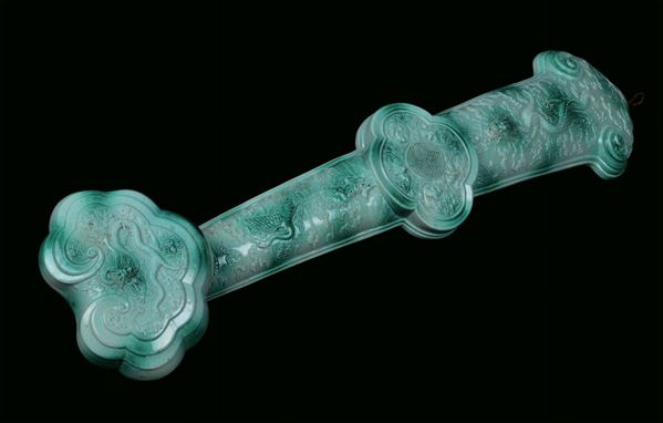 Porcelain green scepter, China, Qing Dynasty, fend 19th century relief decoration with dragons and phoenixes, cm 47