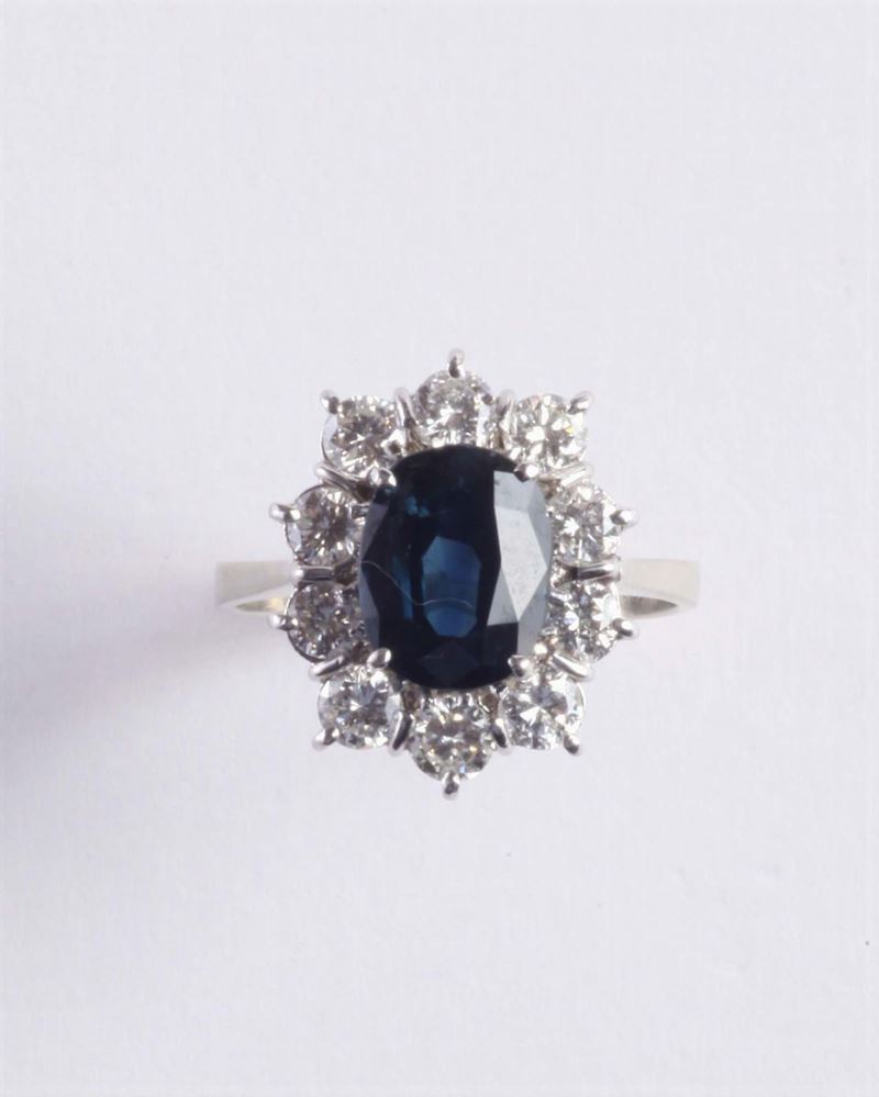Anello con zaffiro Australia e diamanti a contorno  - Auction Silvers, Ancient and Contemporary Jewels - Cambi Casa d'Aste