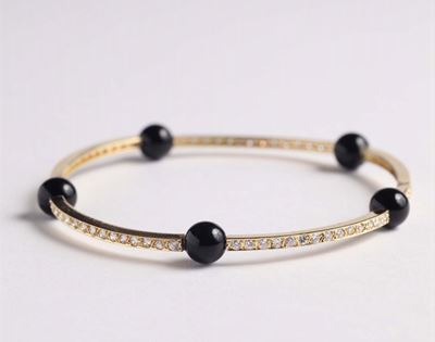 Bracciale Rigido con Diamanti e Onice