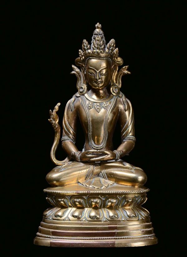 A gilt bronze figure of Amitayus sitting on a lotus flower, China, Qing Dynasty, Qianlong Period (1736-1795)