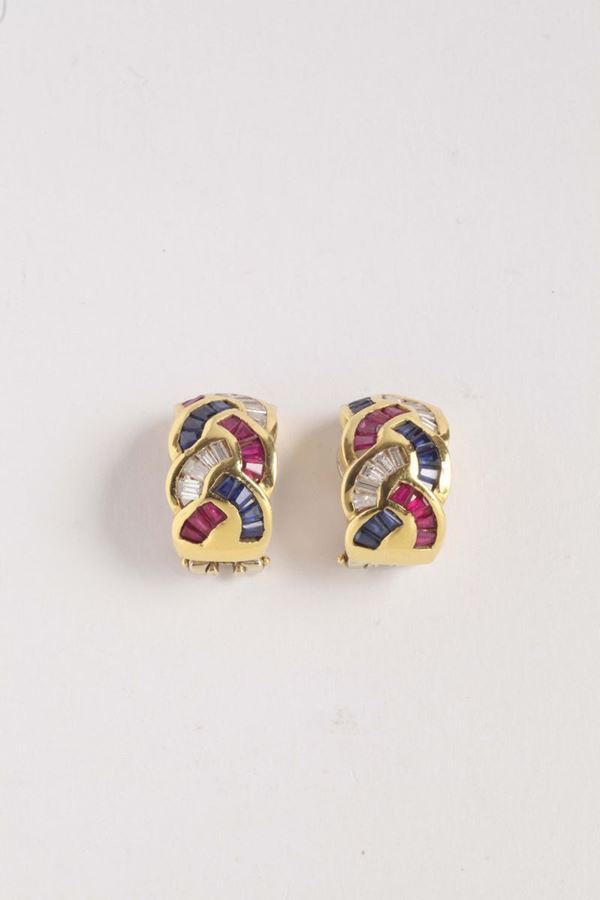 A pair of ruby, sapphire and diamond earrings