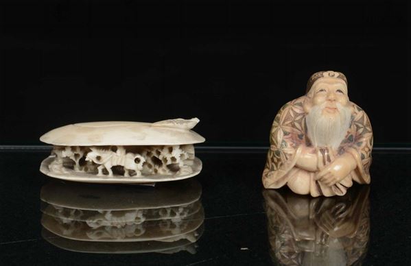A lot of two netsuke, one depicting wise man and a shell-shaped engraved with characters, Japan, 19th century