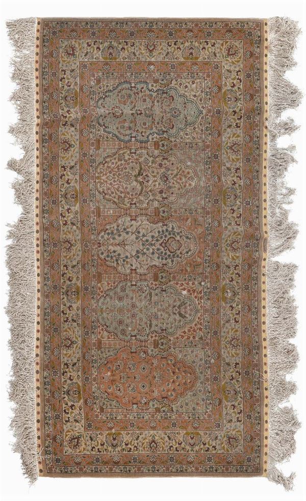 An Anatolia Hereke rug 20th century.Signed Ozonupak very good condition.