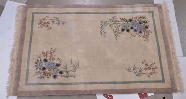 A China carpet 20th century.