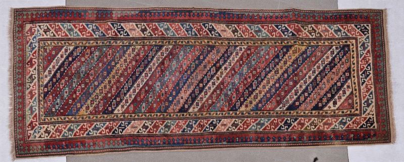 A Caucaso Shirvan Gandjie end 19th century.Ends restored and also the lateral border partially restored.  - Auction Ancient Carpets - Cambi Casa d'Aste
