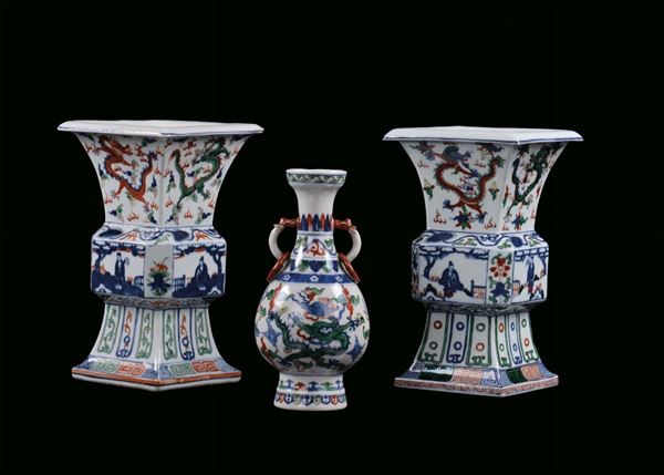 Three Famille Verte porcelain vases, Ducai, China, Qing Dynasty, 20th century h cm 22 and cm 27