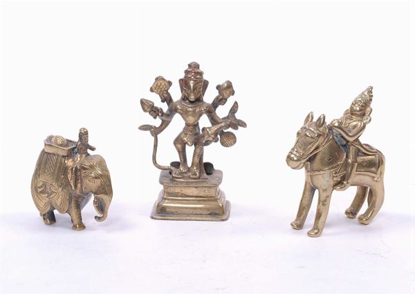 Tre figurine in bronzo dorato