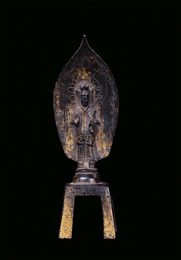 Small bronze archaic Buddha partially gilt, China, Wei Dynasty, 7th century cm 18,5