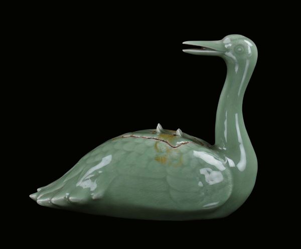 A Celadon green porcelain box in the shape of a duck, China, Qing Dynasty, 19th century