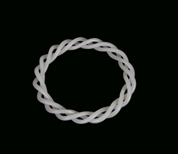 White jade bracelet with three torchon twisted strings, China, Republican Period, 20th century diameter cm 8