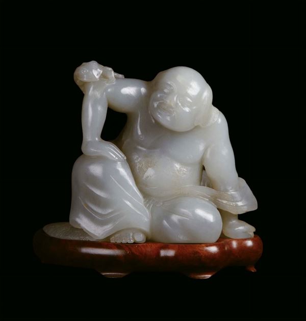 Jade sculpture representing Lohan with frog, China, Qing Dynasty, 19th century cm 8x10