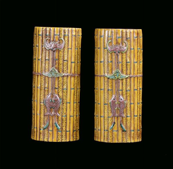Pair of shaped porcelain vases in the shape of bamboo with fishes and bats in relief, China, Qing Dynasty, 19th century h cm 26, Guangxu mark and period