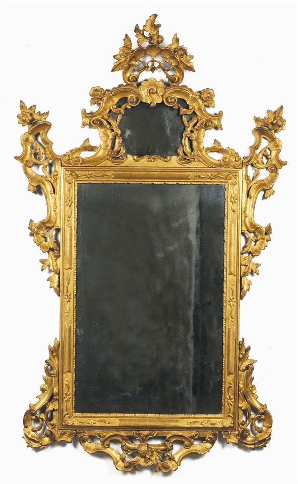 Specchiera in stile Luigi XVI in legno dorato ed intagliato, XIX secolo