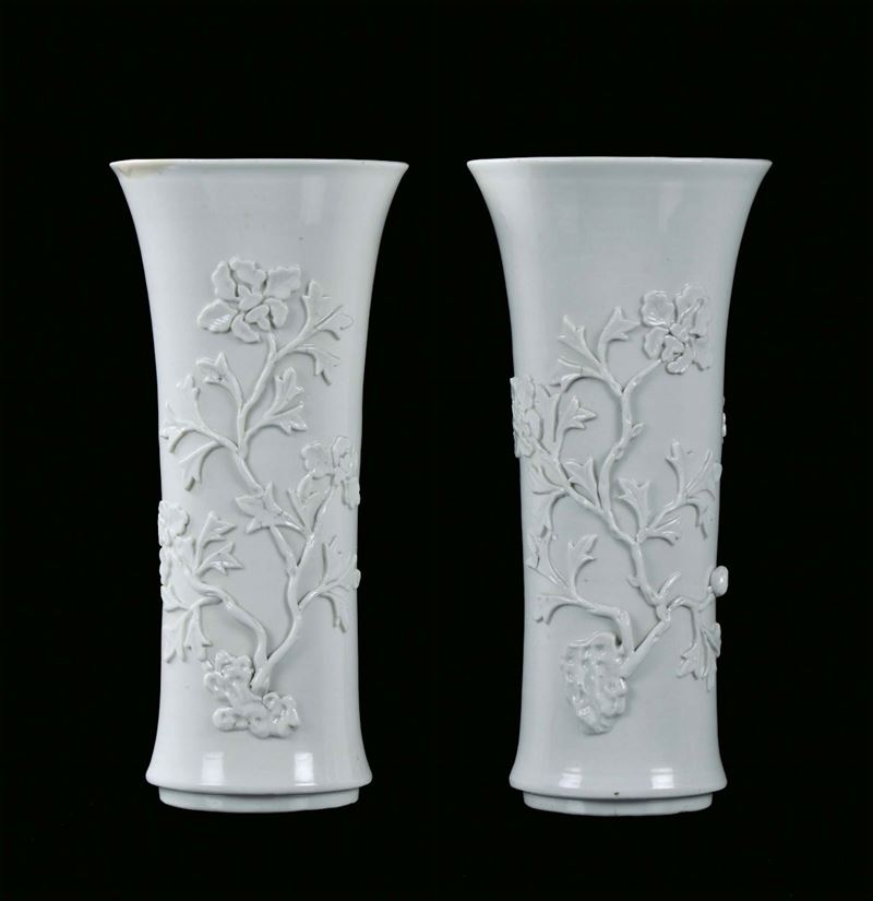 Pair of Blanc de Chine porcelain trumpet vase with relief branches in bloom decorations, China, Dehua, Qing Dynasty, end 17th century    - Auction Fine Chinese Works of Art - Cambi Casa d'Aste