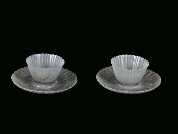 Pair of Mogul green jade small cups with plates, China, Qing Dynasty, Qianlong Period (1736-1795), h cups cm 3,5, diameter plates cm 10