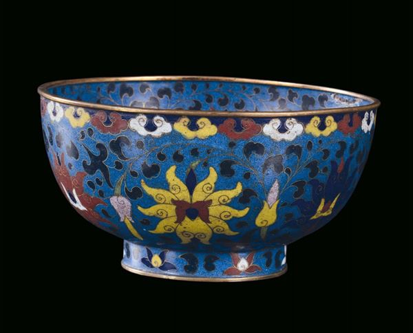 Cloisonné cup with polychrome floral decoration with light blue background, China, Qing Dynasty, 18th century, post marked Ming with four characters under the base, diameter cm 23, h cm 12,5