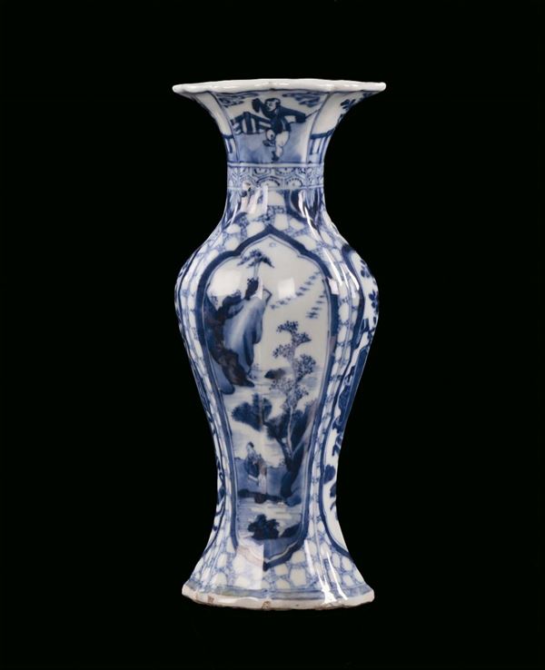 Small polylobed white and blue porcelain vase, China, Qing Dynasty, Kangxi period(1662-1722) monochrome blue decoration with landscapes and flower vases, h cm 29,5
