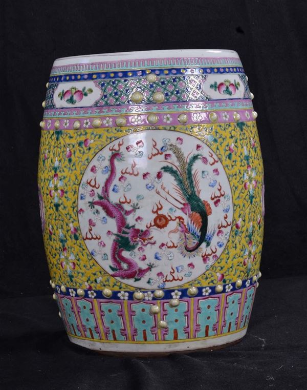 Polychrome stool with dragons phoenixes within reserves on yellow background, China, Qing Dynasty, end 19th century h cm 46