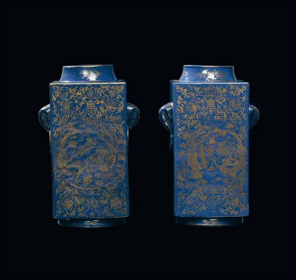Pair of poudre blue porcelain vases with golden decoration, China, Guangxu (1875-1908) h cm 29,5