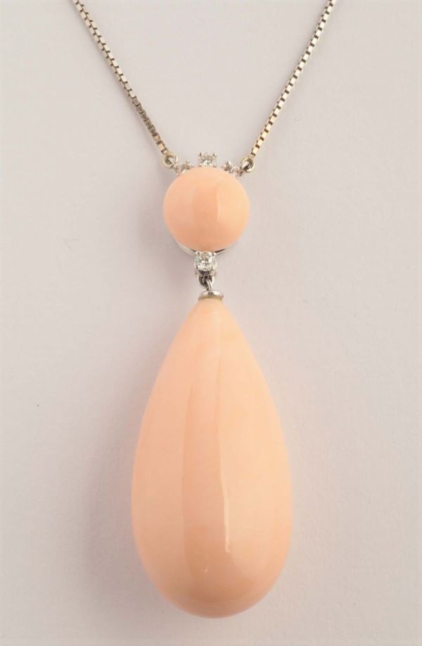A coral pear-shaped pendant