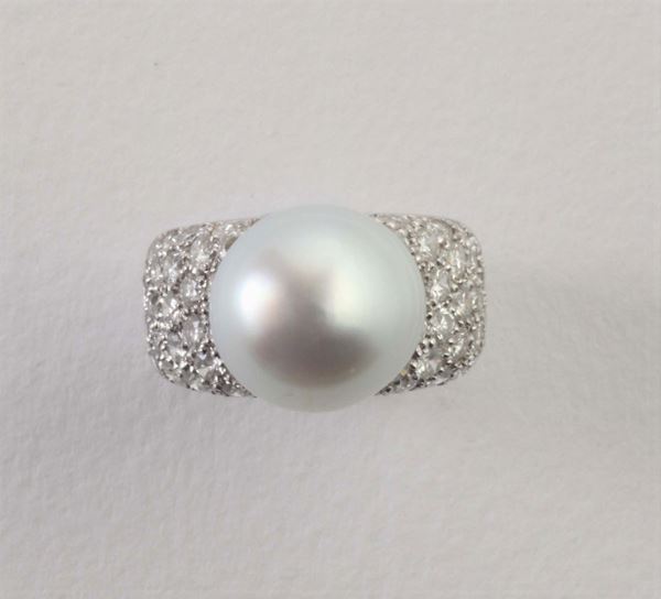 A pavé set and pearl ring