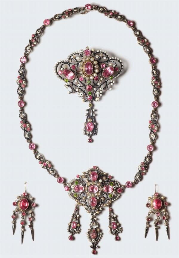An enamel, paste, pearl and peridot suite. 1830 circa