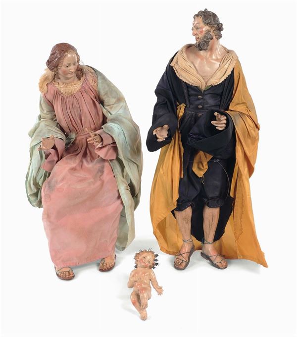 Coppia di statue da presepe raffiguranti Maria e S.Giuseppe con Gesù Bambino, Napoli