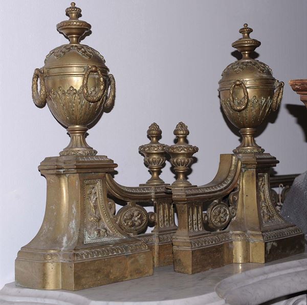 Coppia di alari in metallo dorato, Francia XIX secolo