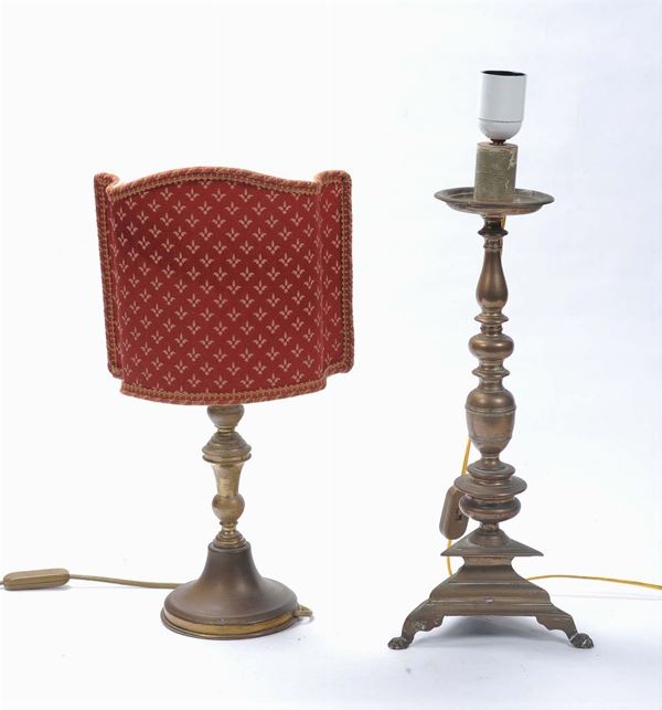 Due lampade da comodino in bronzo differenti