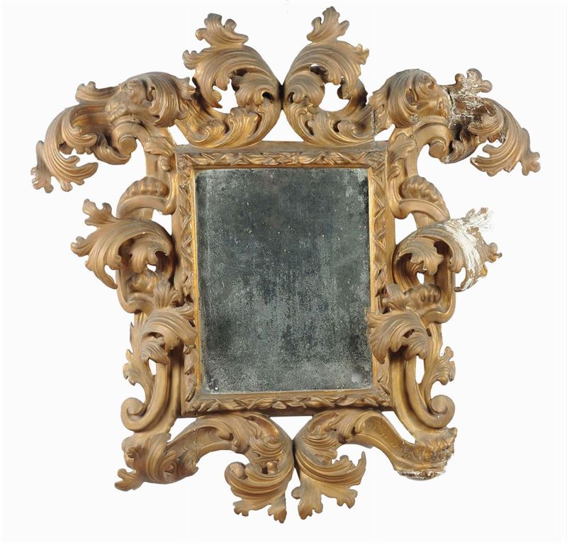 Specchiera in legno intagliato e dorato, XVII secolo  - Asta Eredità Emilio Bruzzone - I - Cambi Casa d'Aste