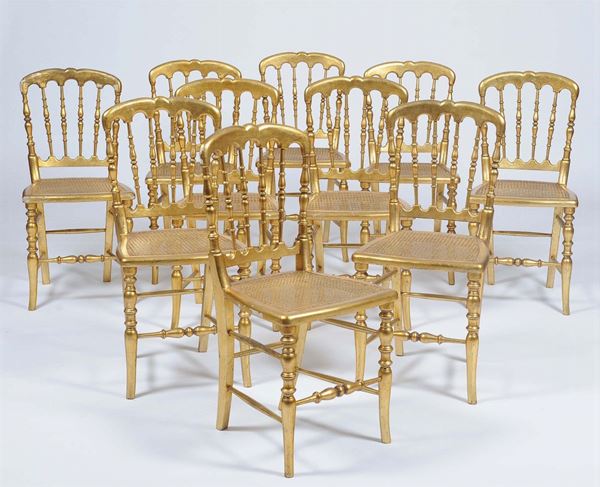 Dieci sedie tipo chiavarine in legno dorato, XX secolo