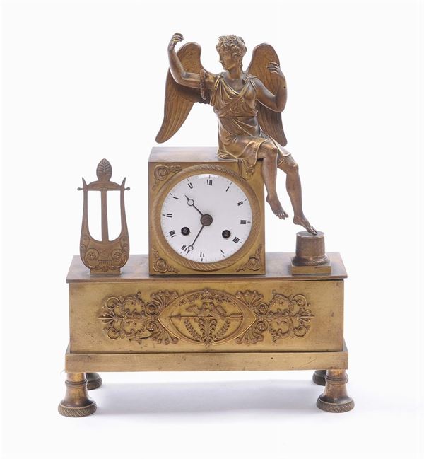 Pendola da tavolo Impero in bronzo dorato