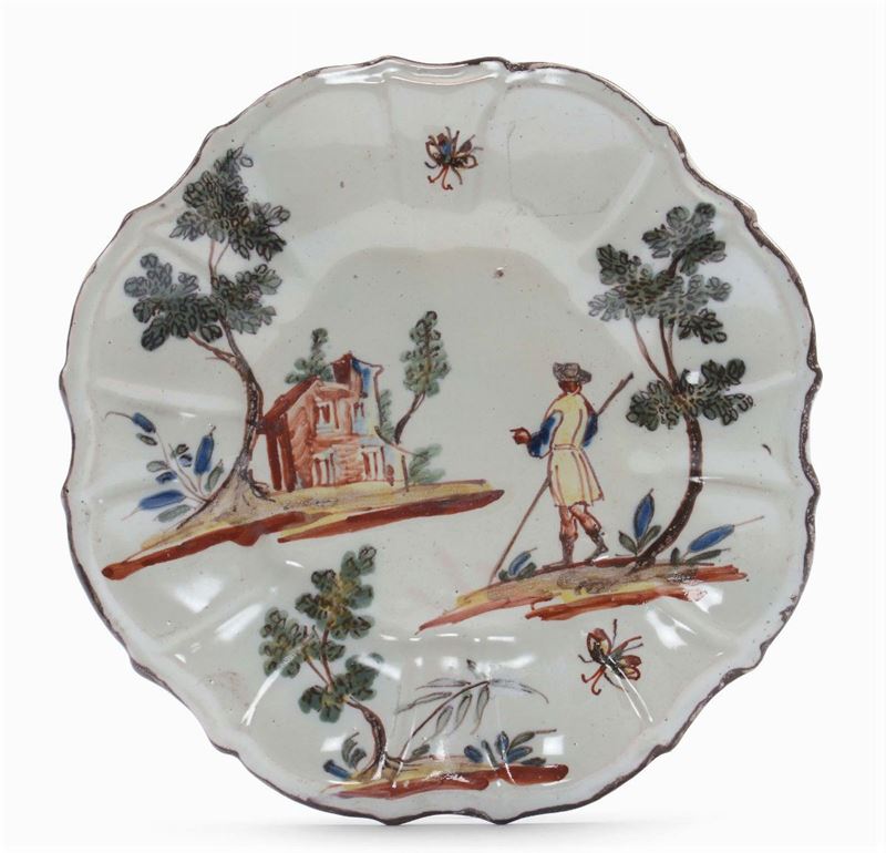 Piattino in maiolica sagomato con decoro a figuretta entro paesaggio, Coppellotti, Lodi XVIII secolo  - Auction Italian Majolica from 16th to 18th Century - Cambi Casa d'Aste